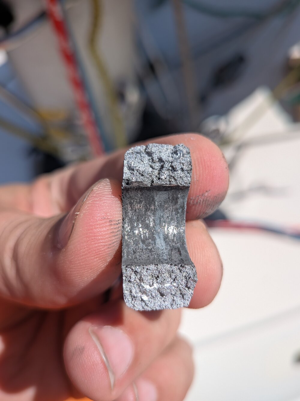 The broken half of the gooseneck casting, snapped clean through
